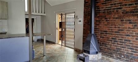 Cozy 2-Bedroom Apartment with a Private Garden