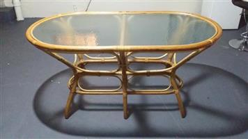 Cane table with glass