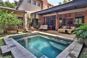 VERSATILE 5-BEDROOM FAMILY HOME WITH PRIVATE FLATLET & EXCEPTIONAL ENTERTAINMENT AREA