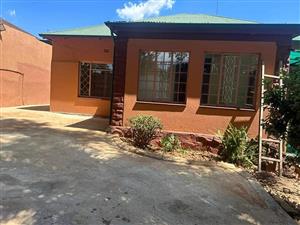 4 bedroom with 2 bathroom house to let in protea Street Kensington jhb.
