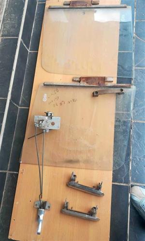 Nissan 1400 doorglasses,  and outer handles