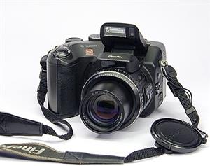 Fujifilm FinePix S602 Zoom with Video mode. Excellent condition. Comes with Brand New Tripod.