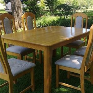 Solid oak dining room table with 6 chairs