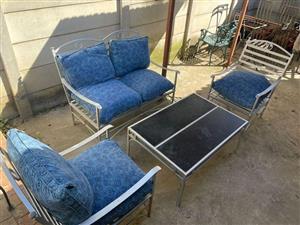 4 seater patio set with coffee table and cushions 