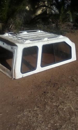  am selling a White used canopy without back glass still in good condition