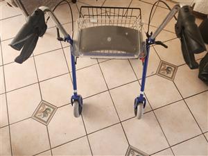 Rollator 4 wheel Deluxe Walker  hardly used.Sturdy and smooth walking for an eld