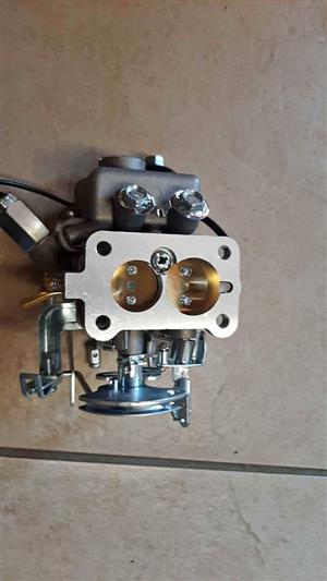 NISSAN 1400 CARBURETTOR. GENUINE. VARIOUS PARTS FOR VARIOUS CARS.