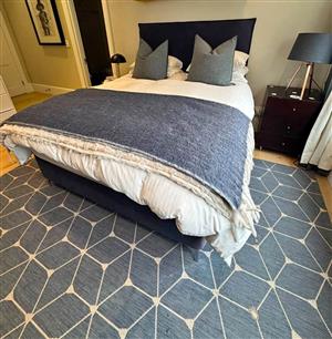 Queen std length base and headboard . Navy blue . good condition no matress . 