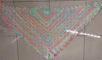 Multicoloured crocheted shawl