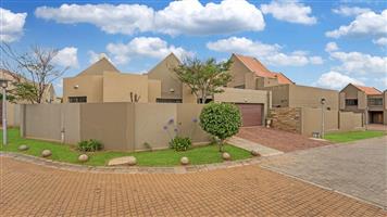 Picture-Perfect Renovated 3 Bedroom 2.5 Bathroom Home with Pool in Secure Estate