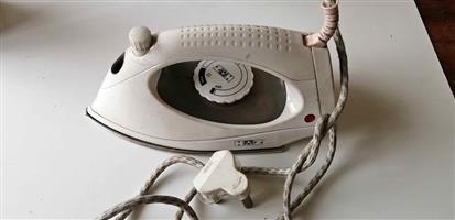 Clothes iron  dry use only, steaming may be faulty