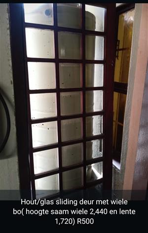 Big wooden glas sliding door for sale come with the wheels size is 2.440x1.720 