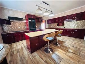 Five Bedrooms: Each bedroom has stunning views of the lush, green garden.