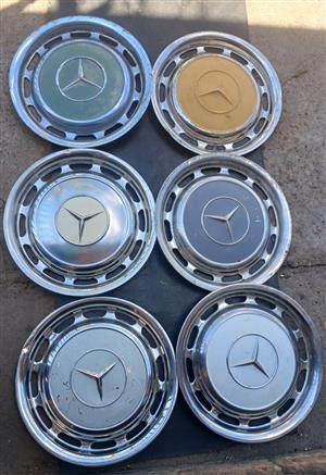 M BENZ STEEL WHEEL HUB CAPS  CALL FOR INFO
