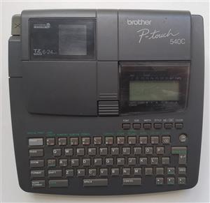 Brother P-Touch 540 for spares. Not working. It is a desktop and portable label 