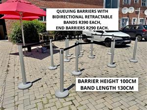 QUEUING BARRIERS WITH BIDIRECTIONAL RETRACTABLE BANDS , END BARRIERS WITHOUT BANDS 