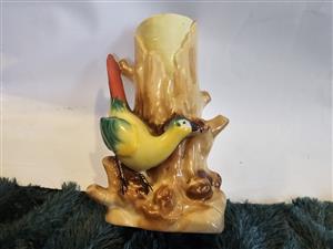 Bird on a tree stump