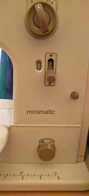 Vintage  Original Swiss-made Bernina Minimatic portable sewing machine in its original carry case.