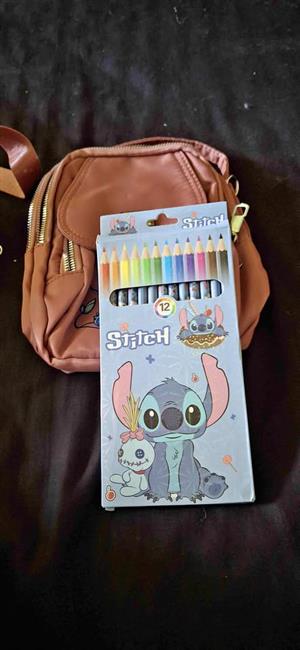 Stitch cross body bag and pencil set