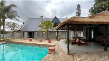 Spacious 4-Bedroom Family Home with 2 bedroom Modern Flatlet and Full Solar System