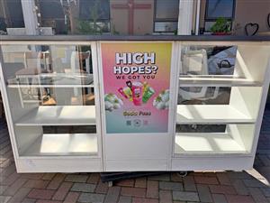 White display shop counter with glass