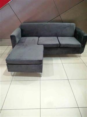 Grey velvet sofa. Corner L shape couch