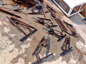 Tip up garage door mechanism