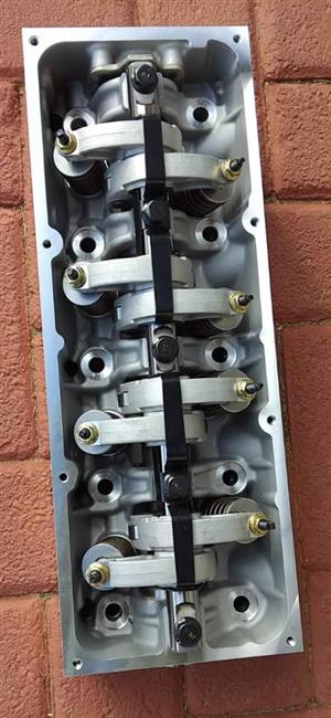 NISSAN NP200 COMPLETE CYLINDER HEAD. BRAND NEW