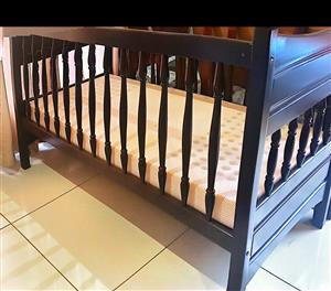 Large sturdy wooden cot
