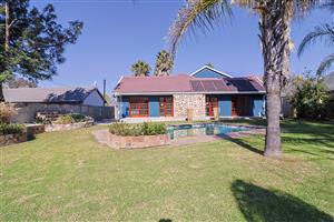 Elegant Entertainer with Pool, Loft, and Garden Paradise