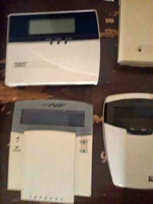 2 hand alarm system keypads