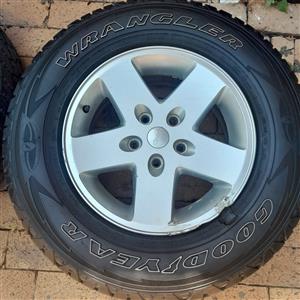2 x Jeep tyres with rims 245/75/R17 for sale . 1x brand new never used. 1x used.