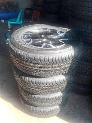 18" Toyota Legend 50 mags with brand new 265/60/18 Dunlop grandtrek AT set 