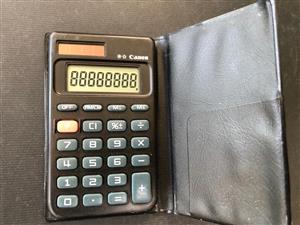Compact Canon solar powered calculator