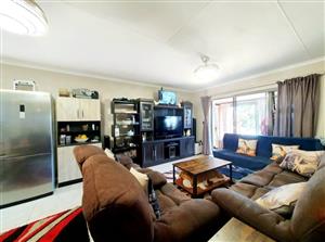 single level town house in the sought-after “De Bosse” complex