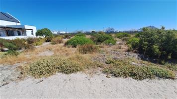 Sought-after coastal north facing plot in private estate