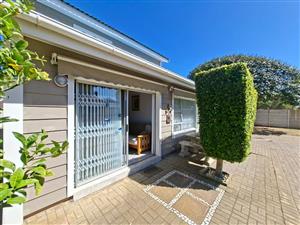 A Refined Retreat in Hartenbos – Modern Townhouse Offering Privacy, Style, and Versatility