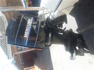 Mercury two stroke 100 Hp for sale with trim and tilt.