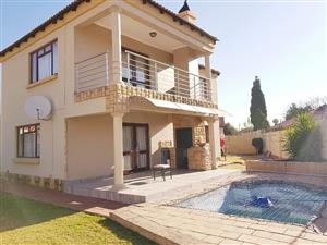 Stunning dbl storey 3 bedr house in a full title estate in Montana with splashpool