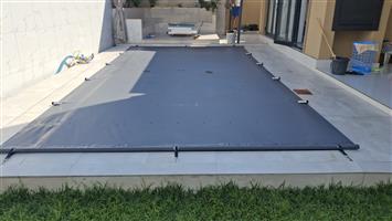 Swimming pool covers