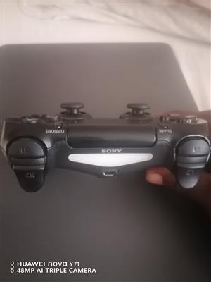 PS4 controller pre owned 