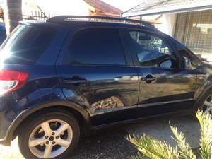  Am selling 2009 Suzuki SX4 Automatic 4 door, Start and go, license up to 