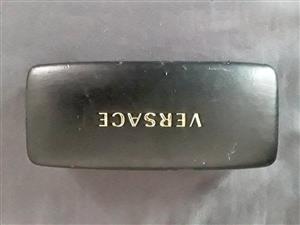 Versace glasses hard shell case with gold print and cleaning cloth