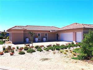 Luxury, Light, and Lifestyle with Greenbelt and Fairway Views