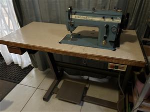 Industrial sewing machine with table