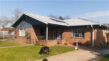 A comfy suburban settling with large corner yard