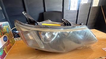Outlander right driver headlight