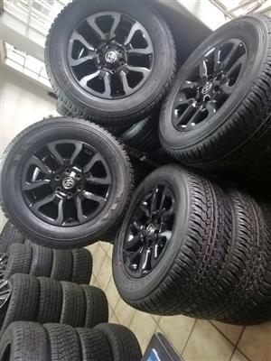 18" Toyota Legend 50 Rs original mags with brand new 265/60/18 Dunlop A/T set 
