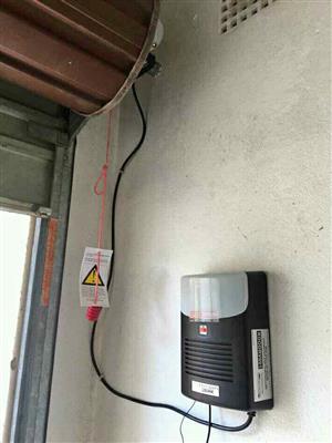 Rollup garage door motor