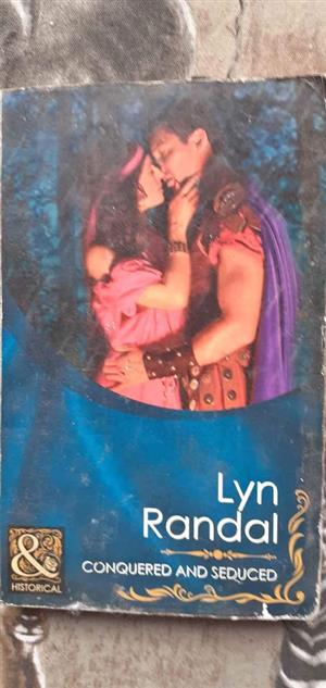 Conquered and Seduced  Lyn Randal